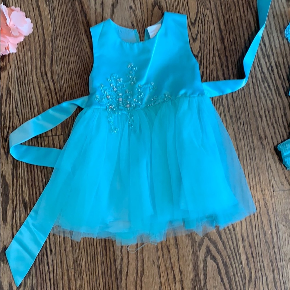 Aqua color embellished Dress by Tip top Kids